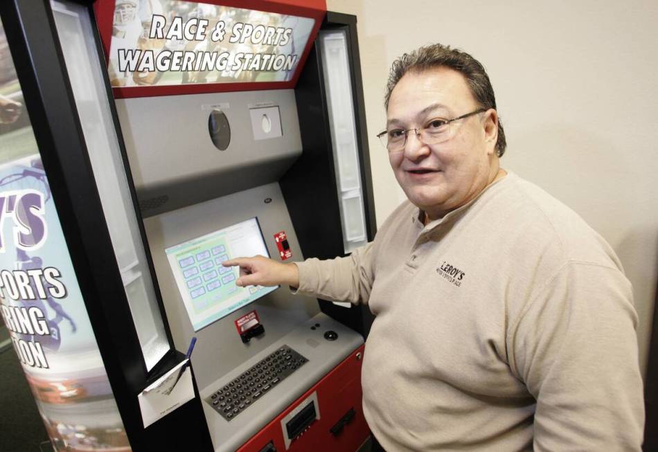 American Wagering CEO, Vic Salerno with a kiosk, Tuesday morning, January 11, 2005. (Las Vegas ...