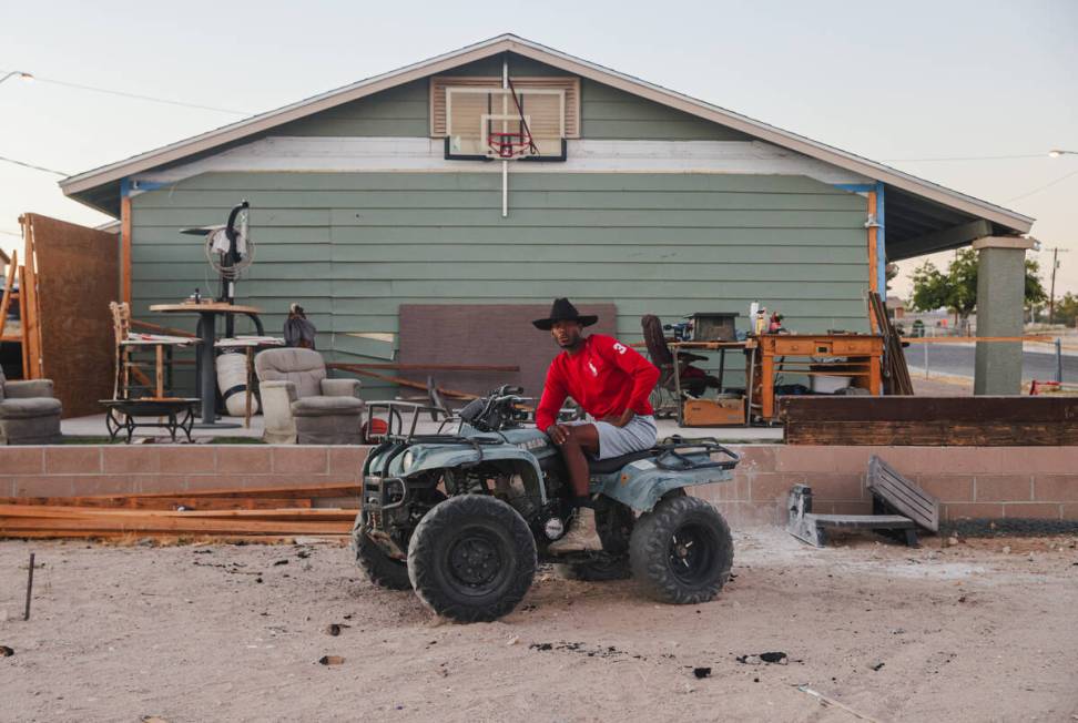 Local resident Burgess Houston III poses for a portrait at his home in the Windsor Park neighbo ...