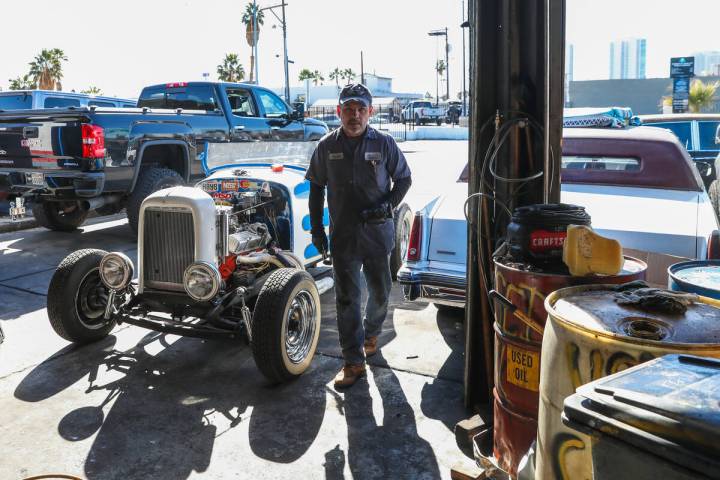 Ismael Cerda works on a classic car at Pop's Automotive on Monday, Feb. 12, 2024, in Las Vegas. ...