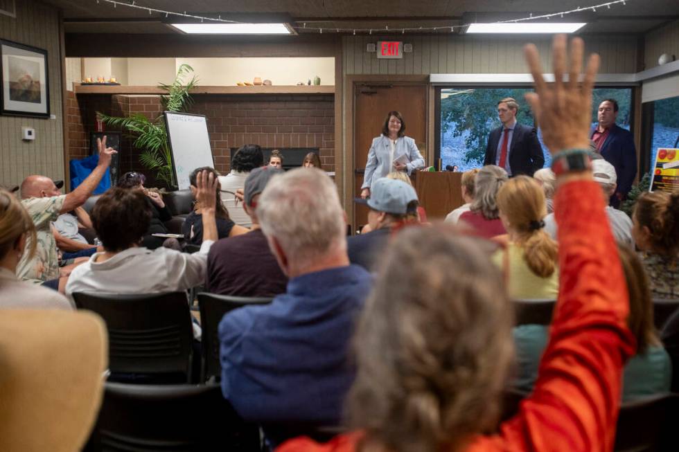 Members of the Mount Charleston community question district representatives and Clark County Sc ...