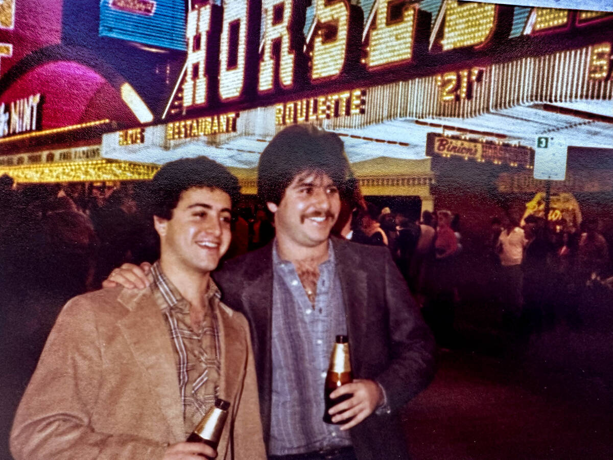 Jeff German and his brother Jay are seen enjoying beers in front of the Binions Casino in this ...