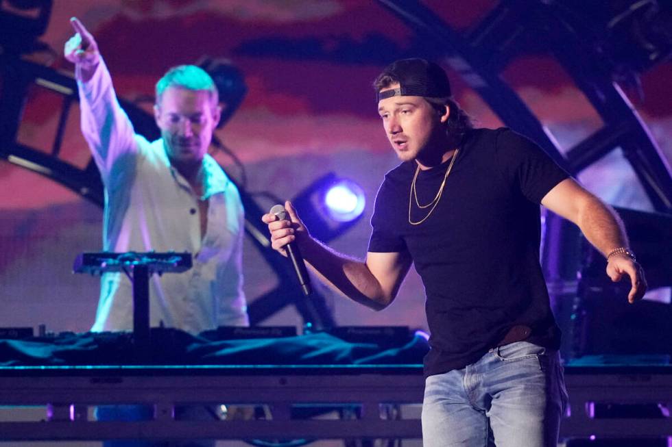 Morgan Wallen, right, performs with Diplo on the first night of the 2022 iHeartRadio Music Fest ...