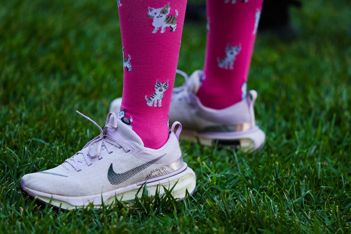 Maria Chairez stands in the grass with other runners during a Las Vegas Girls Run Club meeting ...