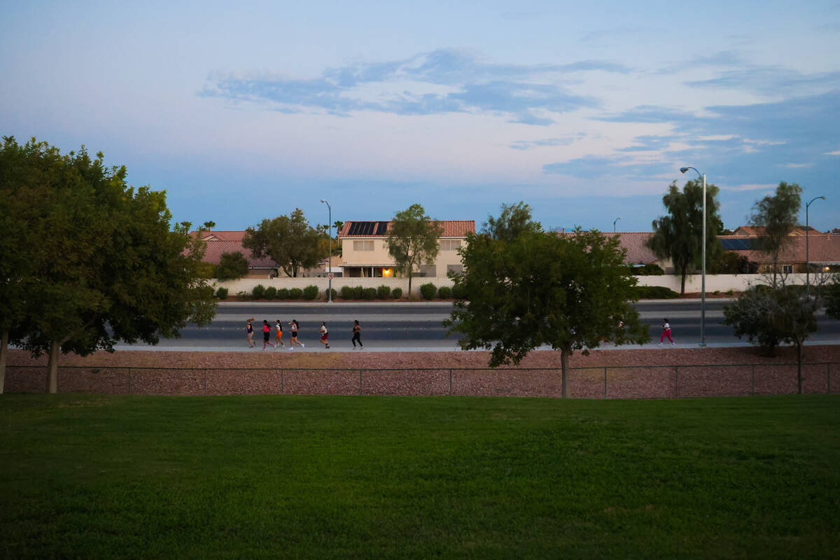 Runners with the Las Vegas Girls Run Club run together at Seastrand Park on Wednesday, Aug. 7, ...