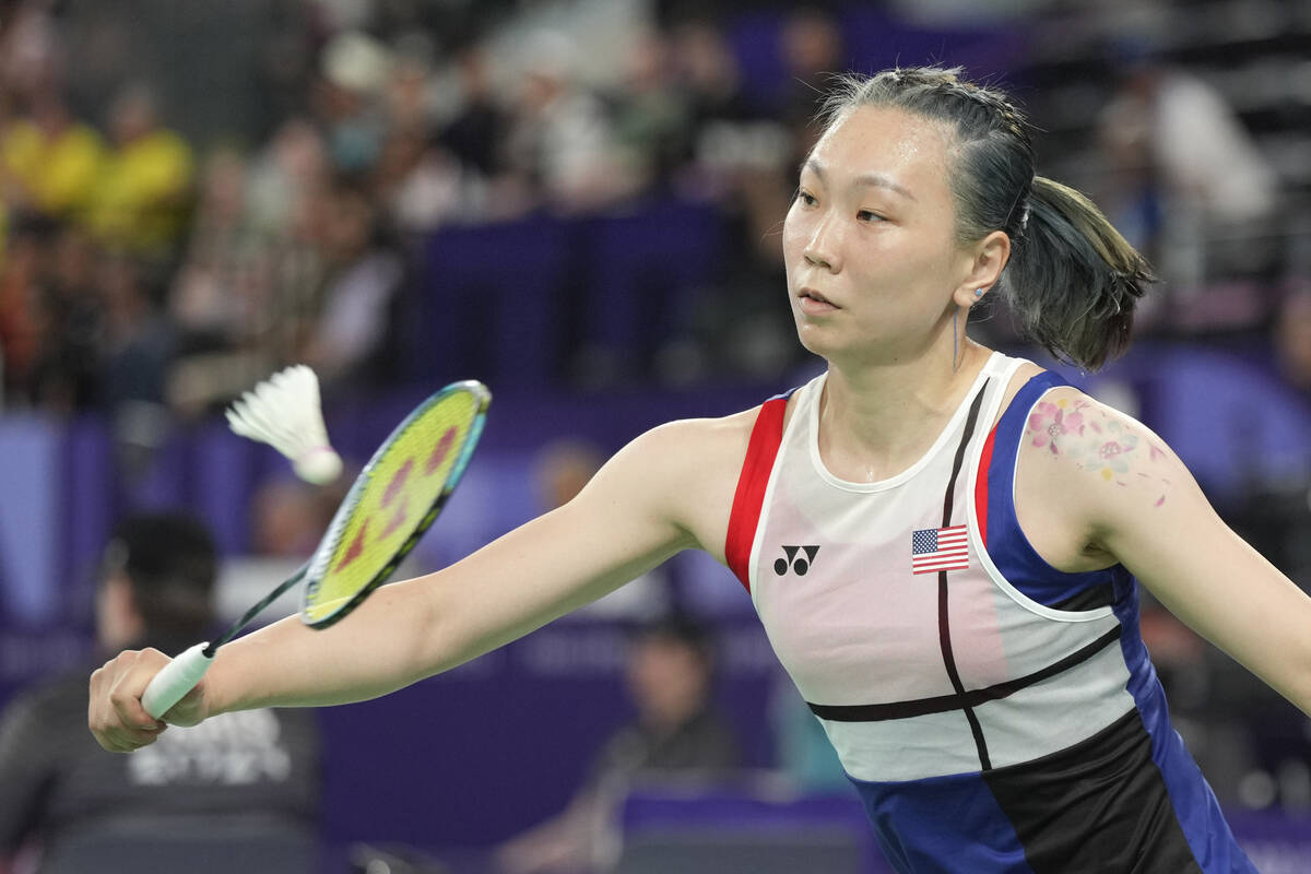 United States' Beiwen Zhang plays against Spain's Carolina Marin during their women's singles b ...