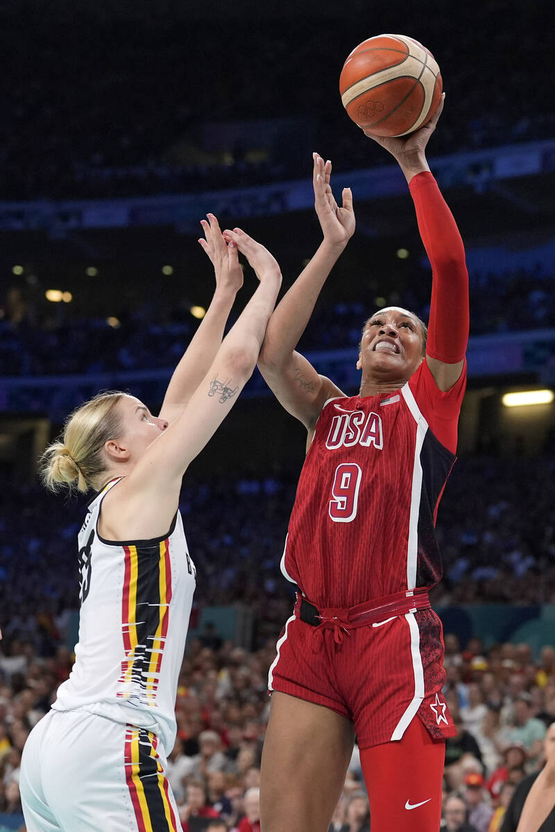 United States' A'ja Wilson, right, shoots as Belgium's Beckey Massey defends during a women's b ...