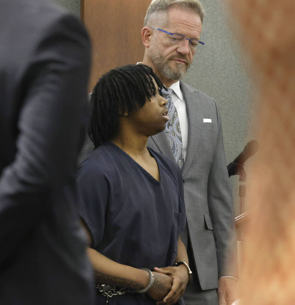 Gianni Robinson appears in court with his attorney Robert Draskovich during a pretrial conferen ...