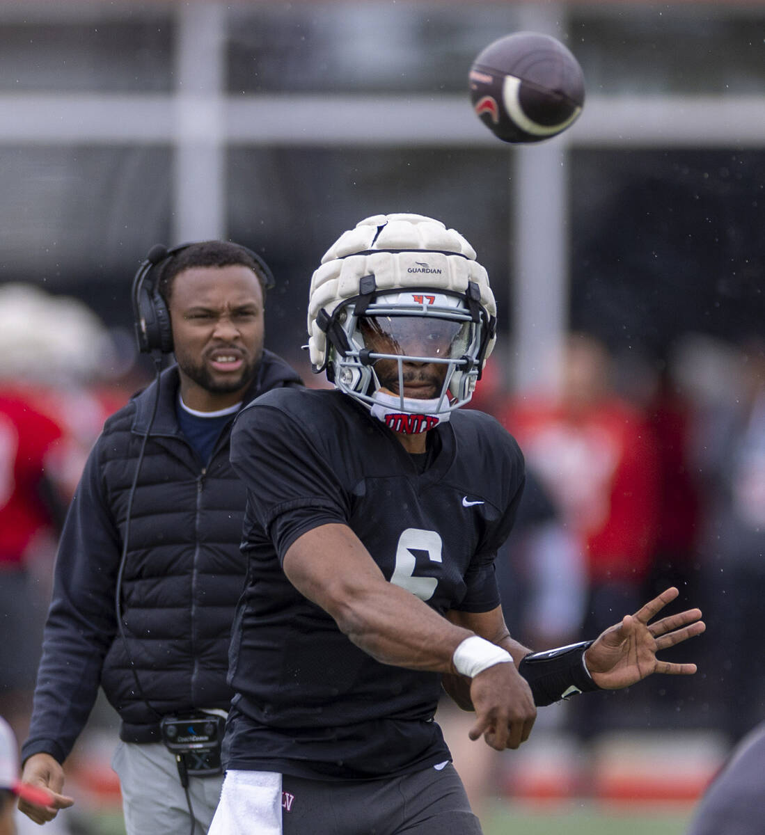 UNLV quarterback Hajj-Malik Williams (6) releases a pass to a receiver during spring football p ...