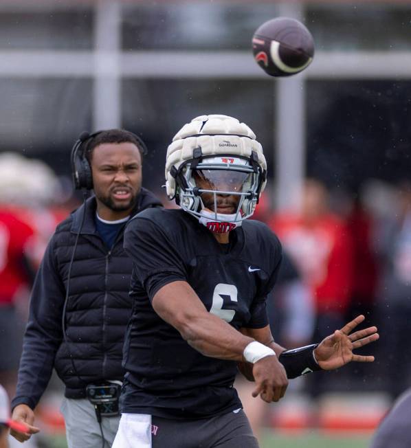 UNLV quarterback Hajj-Malik Williams (6) releases a pass to a receiver during spring football p ...