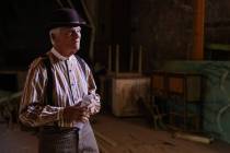 Goldfield Historical Society president John Ekman stands inside of the Lyric Theatre during Gol ...