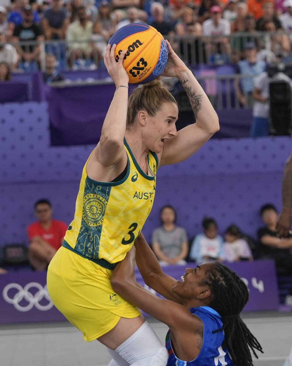 Australia's Lauren Mansfield (33) protects the ball from Azerbaijan's Tiffany Hayes in the wome ...