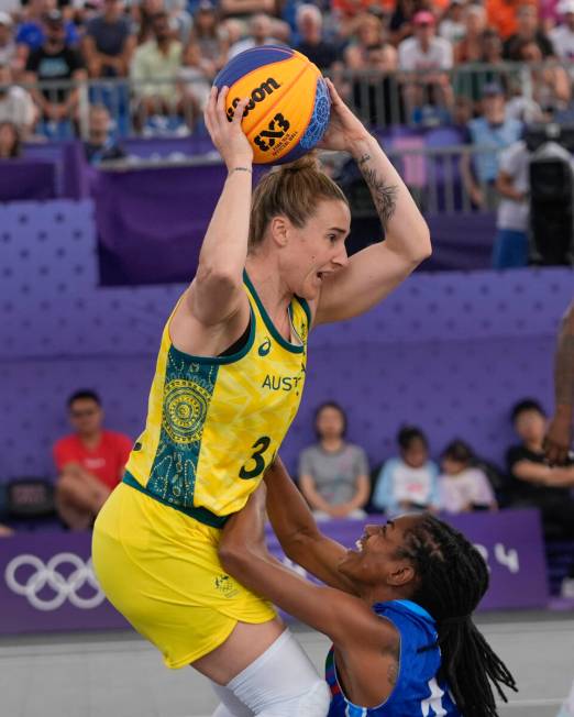 Australia's Lauren Mansfield (33) protects the ball from Azerbaijan's Tiffany Hayes in the wome ...