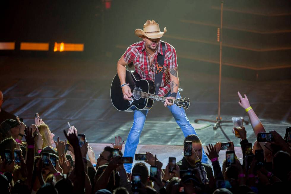 Jason Aldean performs at the Park MGM's Park Theater in Las Vegas on Friday, Dec. 6, 2019. (Las ...