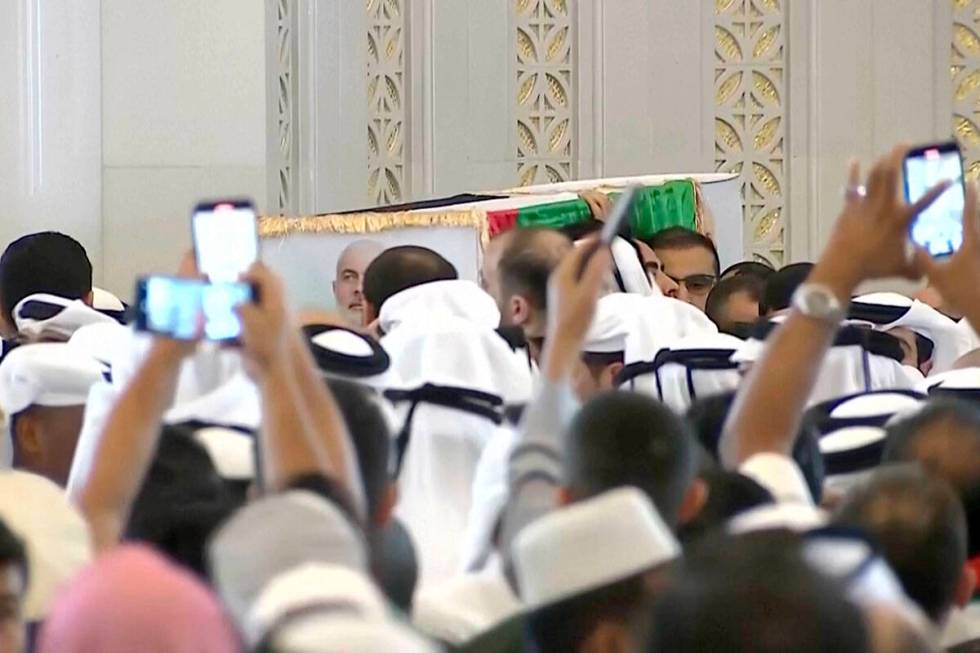 This video grab shows Hamas leader Ismail Haniyeh's coffin being carried out after the funeral ...