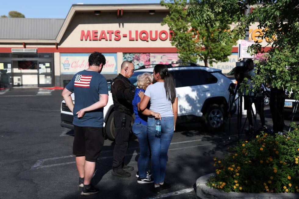 Luby Grunden, second from right, a spokesperson for the family of Alexander Maceo-Sanabria, is ...