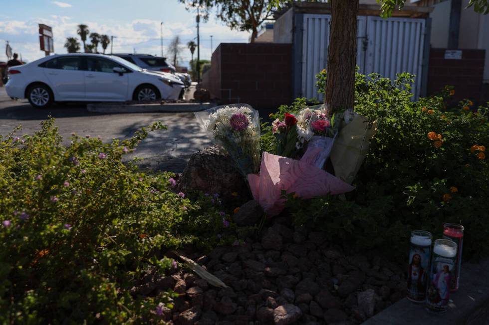 A small memorial sits outside the Marketon supermarket at the intersection of North Decatur Bou ...