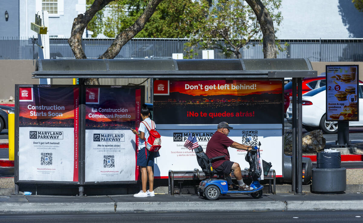 Signs at a stop announce construction as the $378 million Maryland Parkway Bus Rapid Transit pr ...