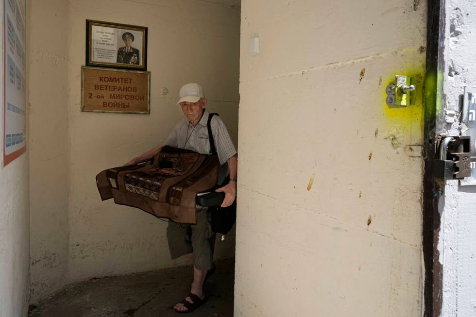 A man readies a bomb shelter in Ashdod, southern Israel, Sunday, Aug. 4, 2024, after the city o ...