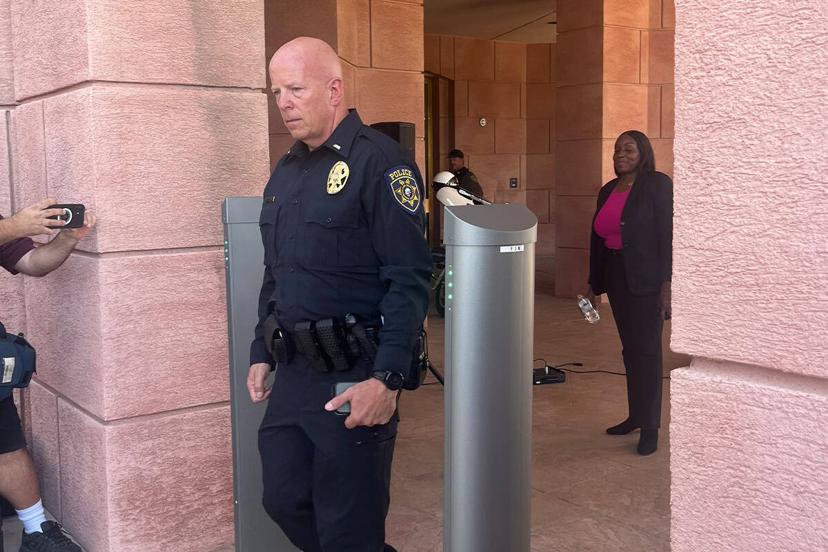 Clark County School District Police Department Lieutenant Bryan Zink tests a new weapons detect ...