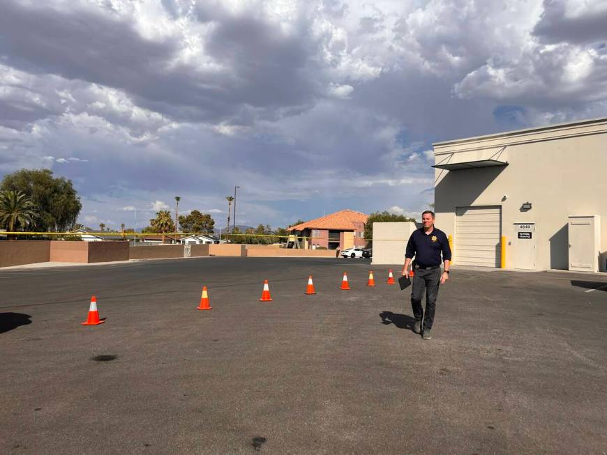 Metro Homicide Lieutenant Jason Johansson gives a briefing on a shooting that left a woman dead ...