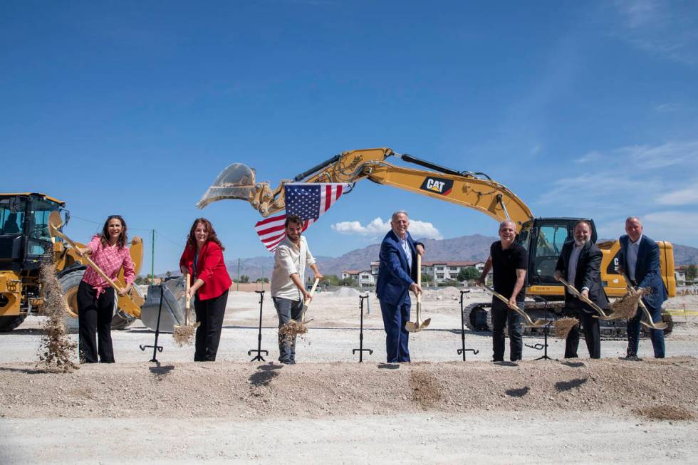 Nevada Gov. Joe Lombardo, center, joined by other officials from the state, Clark County, and t ...