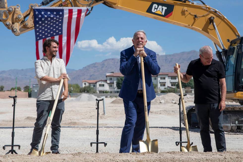 Nevada Gov. Joe Lombardo, center, waits to break the ground during the Ovation Development Corp ...