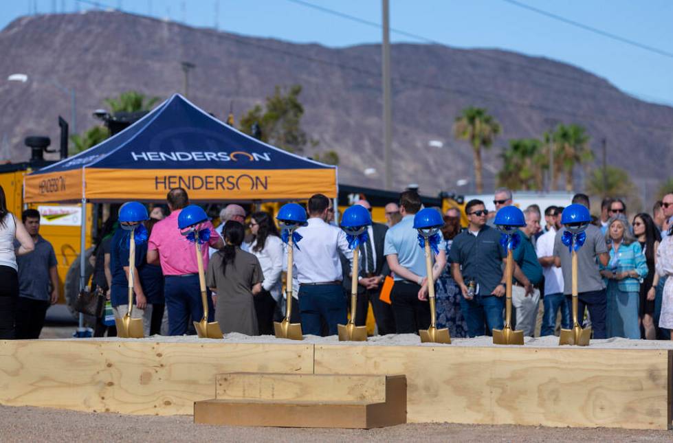 Attendees join dignitaries after they break ground on the Reimagine Boulder Highway project on ...