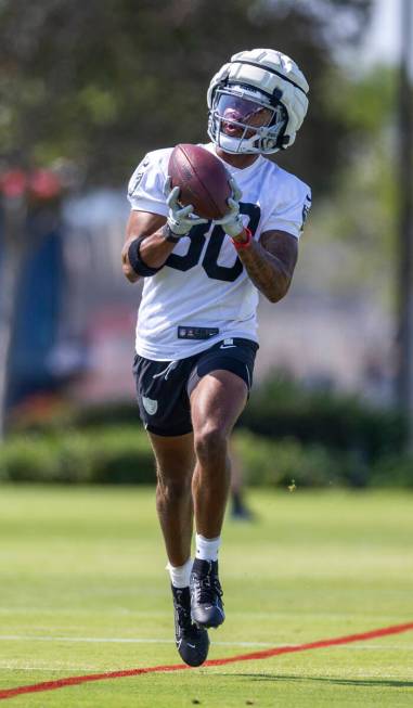 Raiders wide receiver Jeff Foreman (80) catches a pass during the first day of Raiders training ...