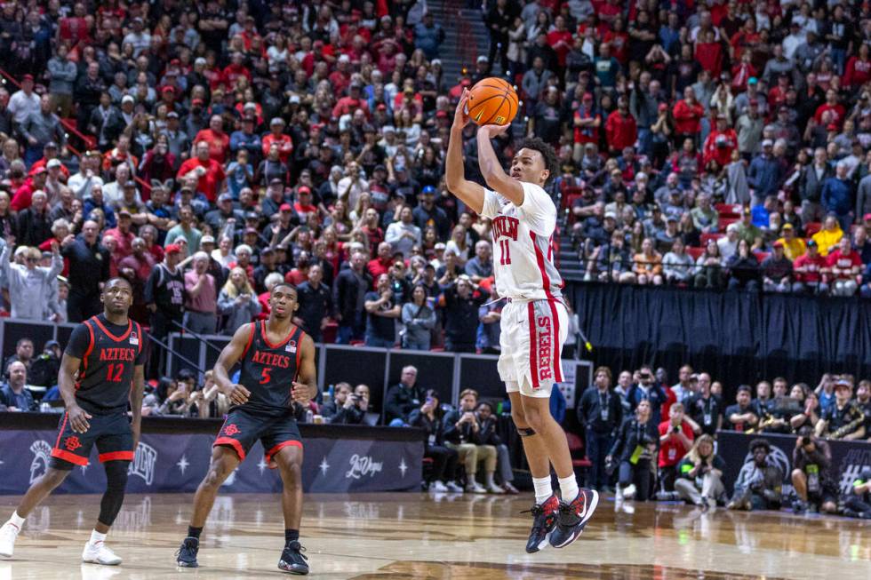 UNLV Rebels guard Dedan Thomas Jr. (11) shoots for the win but misses against the San Diego Sta ...