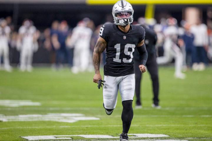 Raiders wide receiver DJ Turner (19) jogs on the field before an NFL game against the Denver Br ...