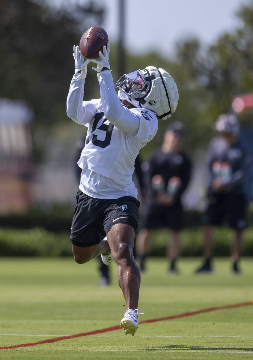 Raiders wide receiver DJ Turner (19) catches a pass during the first day of Raiders training ca ...