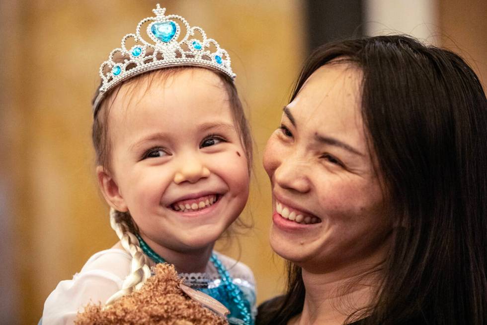 June Chen holds her daughter Samantha Buckley, 5, during a Make-A-Wish Southern Nevada trip to ...