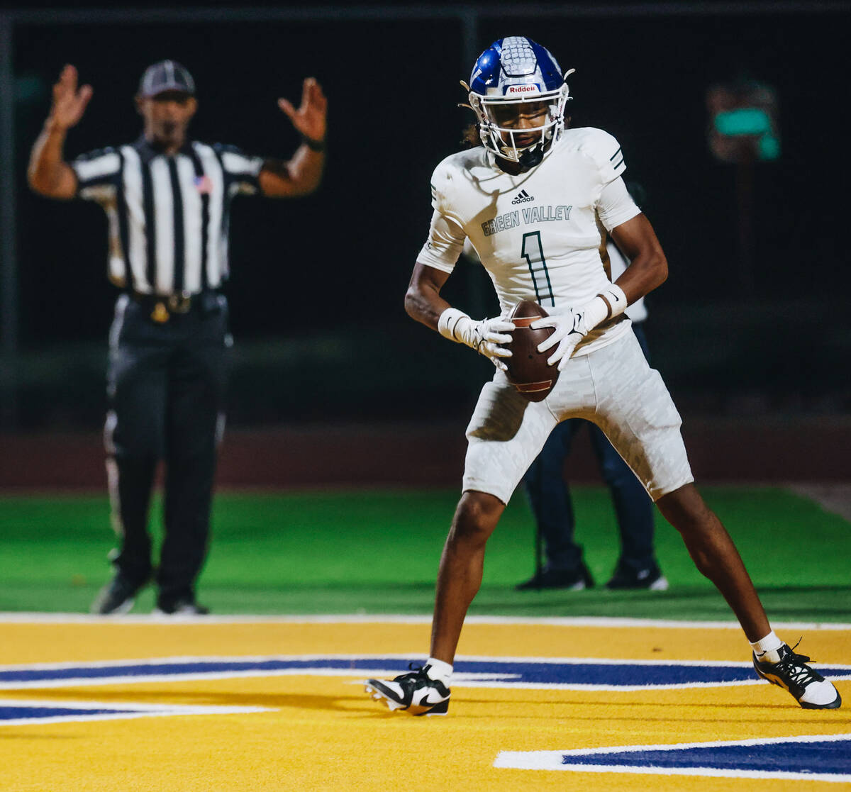 Green Valley wide reciter Trey Glasper (1) makes a touchdown during a game against Green Valley ...