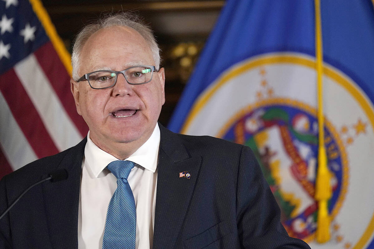 FILE - Minnesota Gov. Tim Walz speaks to the media, Nov. 9, 2022, in St. Paul, Minn. (AP Photo/ ...