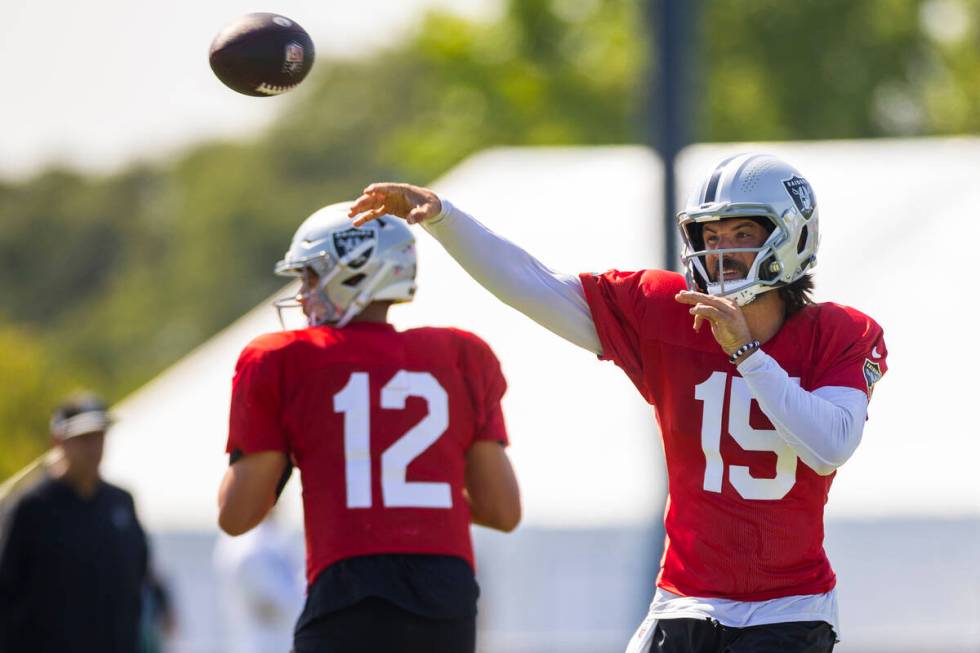 Raiders quarterback Gardner Minshew (15) gets off a pass during the third day of Raiders traini ...