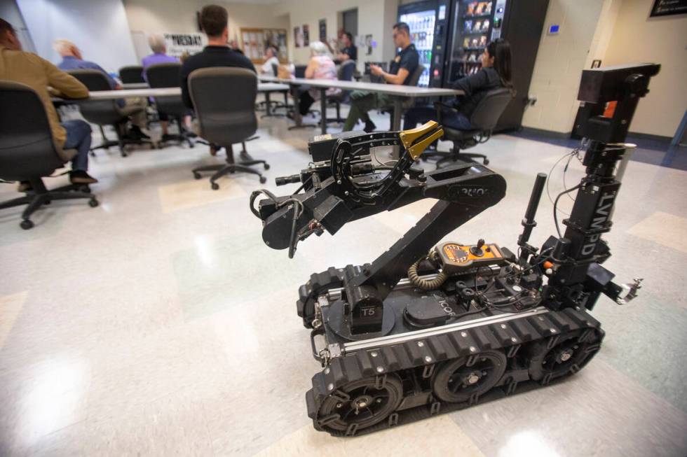 Las Vegas Metro Police Department ARMOR division’s T5 robot sits at the back of the room ...