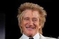 British pop icon Rod Stewart smiles while he speaks as he presents the Teaching award at King C ...