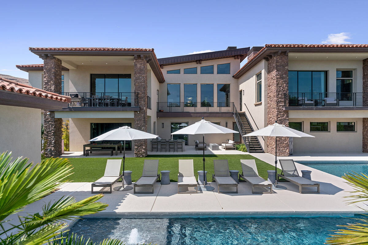 The Olympia Canyon Way estate showcases a resort-style pool area. (Edgar Lara, DronePixel)