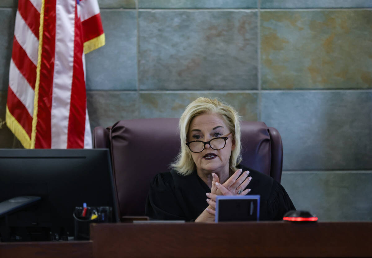 District Judge Michelle Leavitt presides over a hearing for Robert Telles, the former public of ...