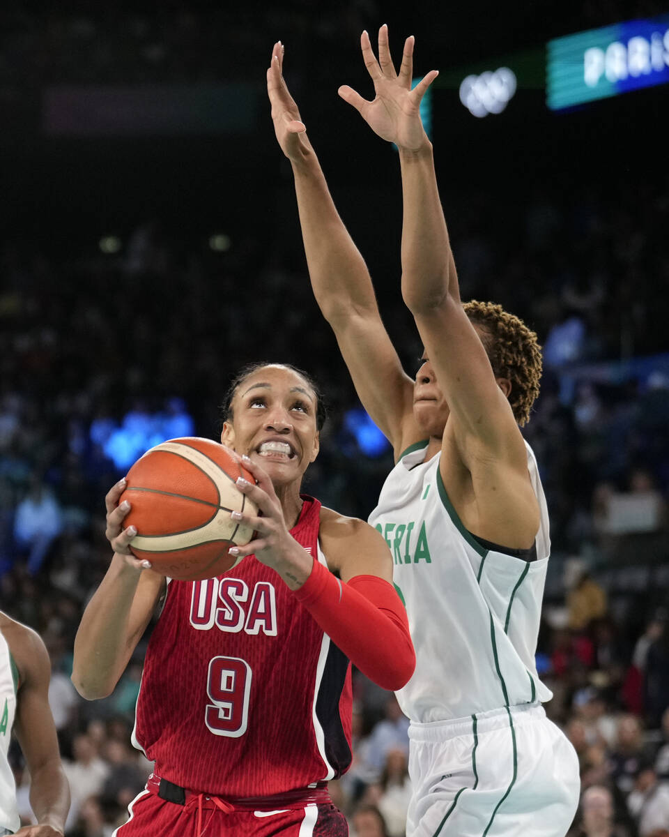 United States' A'ja Wilson (9) shoots on Pallas Kunayi Akpanah (3), of Nigeria, during a women' ...