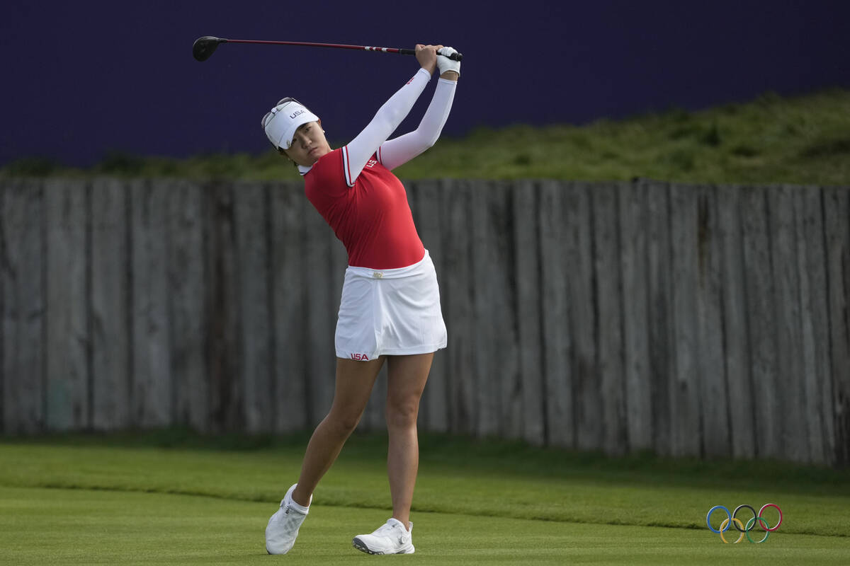 Rose Zhang, of the United States, hits her shot from the 1st tee during the first round of the ...