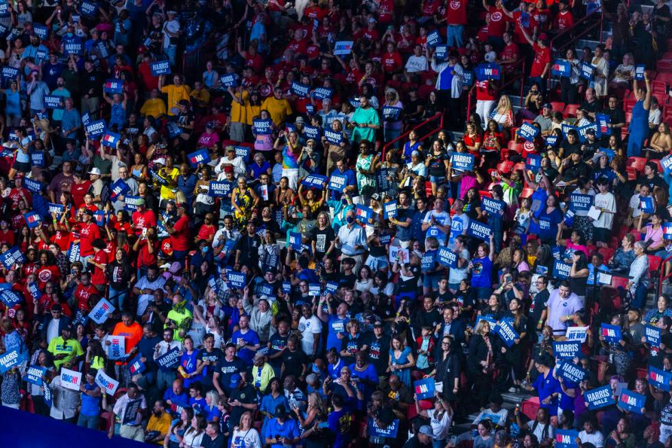 The crowd gets pumped up while dancing to music by DJ D-Nice as Vice President Kamala Harris an ...