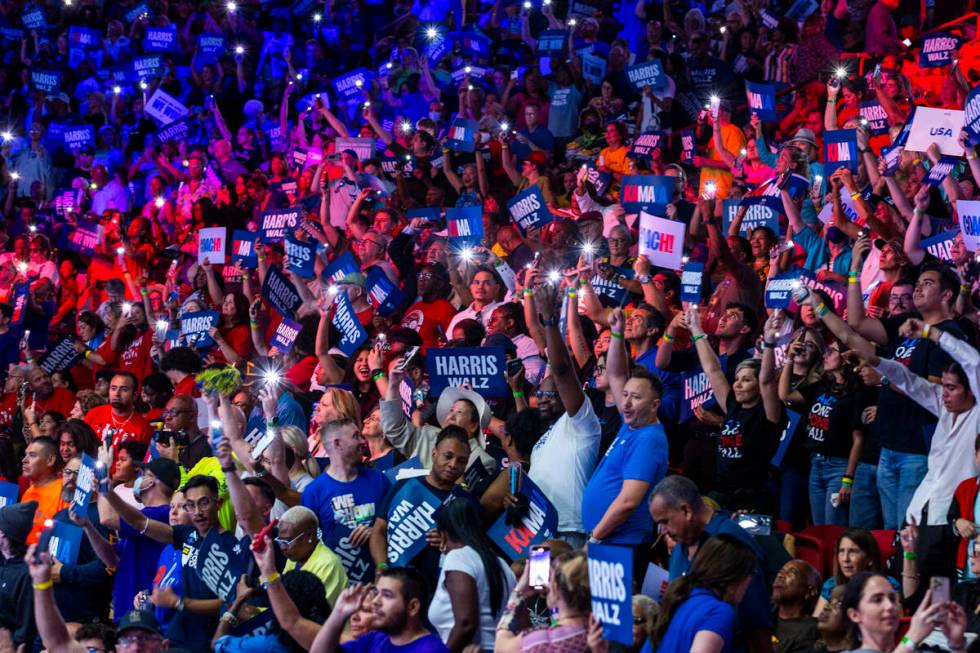 The crowd gets pumped up while dancing to music by DJ D-Nice as Vice President Kamala Harris an ...