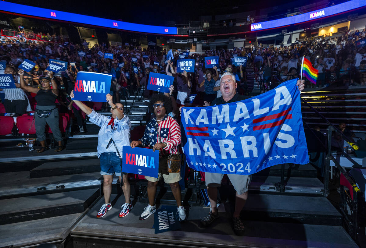 (LtoR) Rebekah Saiz, Tilminah Archibald and Clark Willits join others in dancing to music by DJ ...