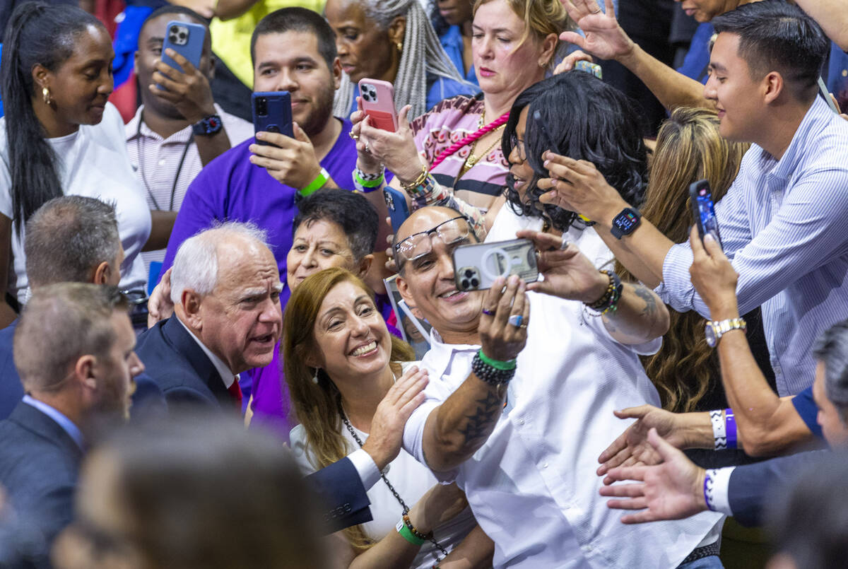 Minnesota Gov. Tim Walz greets supporters following a campaign rally at UNLV’s Thomas &a ...