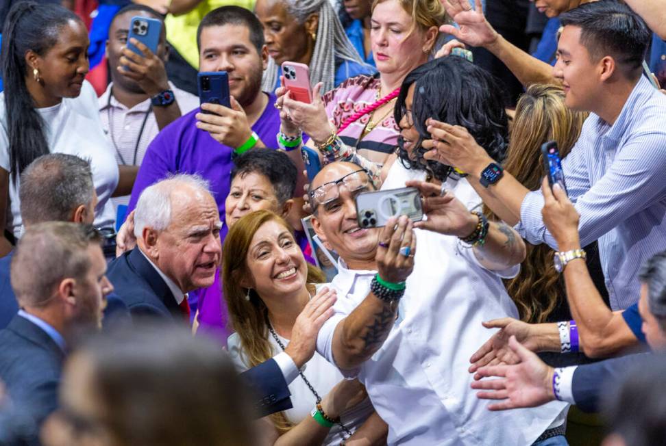 Minnesota Gov. Tim Walz greets supporters following a campaign rally at UNLV’s Thomas &a ...