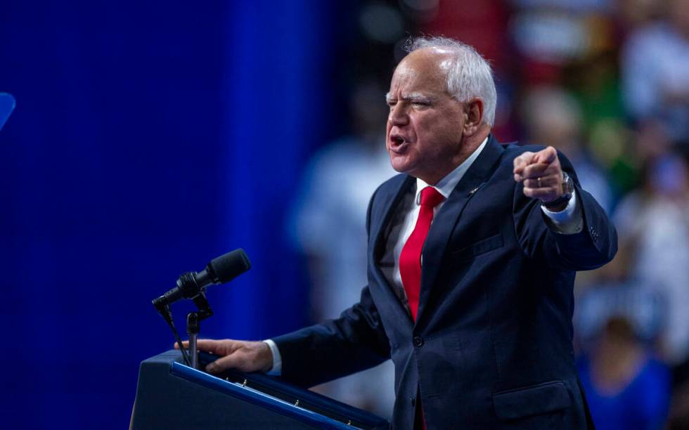 Minnesota Gov. Tim Walz speaks on stage as he and Vice President Kamala Harris hold a campaign ...