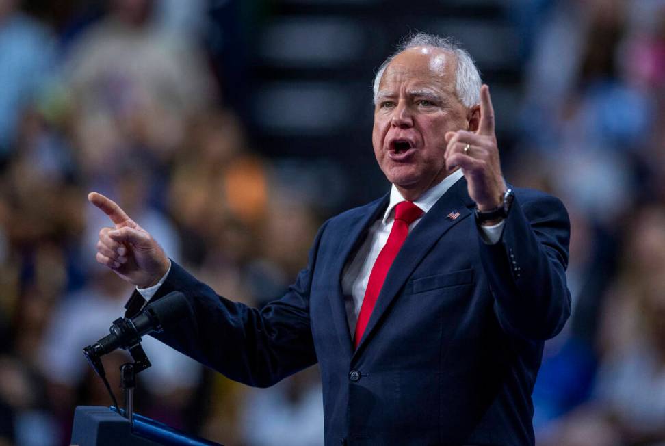 Minnesota Gov. Tim Walz speaks on stage as he and Vice President Kamala Harris hold a campaign ...