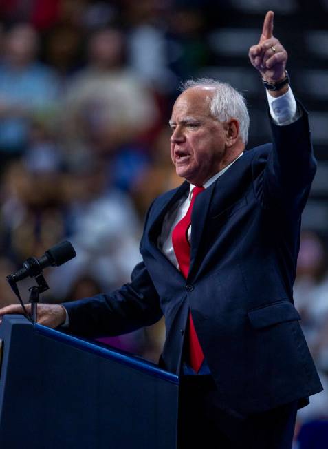 Minnesota Gov. Tim Walz speaks on stage as he and Vice President Kamala Harris hold a campaign ...