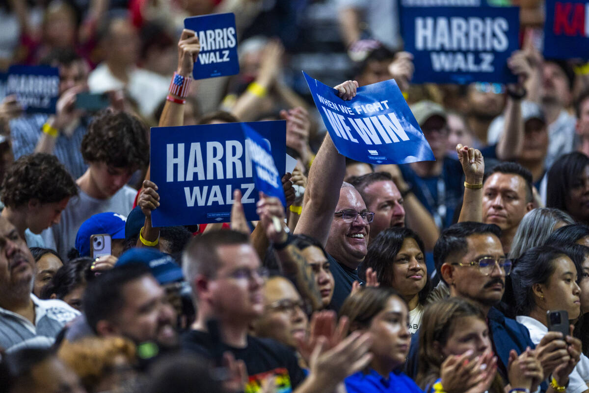 Supporters cheer as Vice President Kamala Harris speaks during a campaign rally at UNLV’ ...